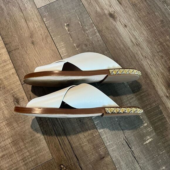 Stuart Weitzman White Sandals with Gold Accents - Picture 4 of 14